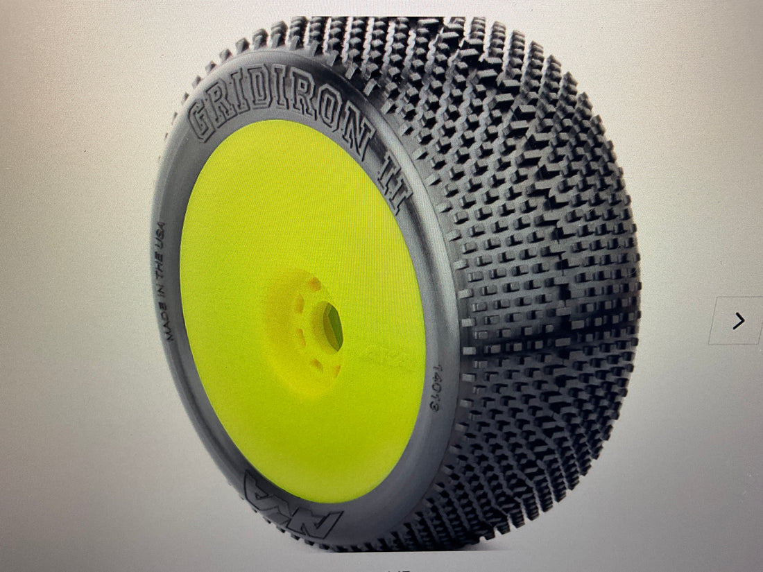AKA PRODUCTS, INC. 1/8 Gridiron II Soft Long Wear Pre-Mounted Tires, Yellow EVO Wheels (2): Buggy